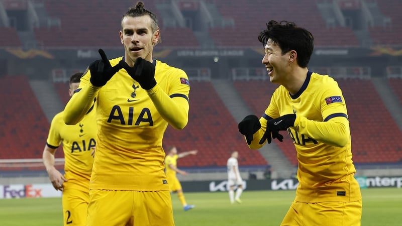 Gareth Bale celebrates with fellow goalscorer Son Heung-Min