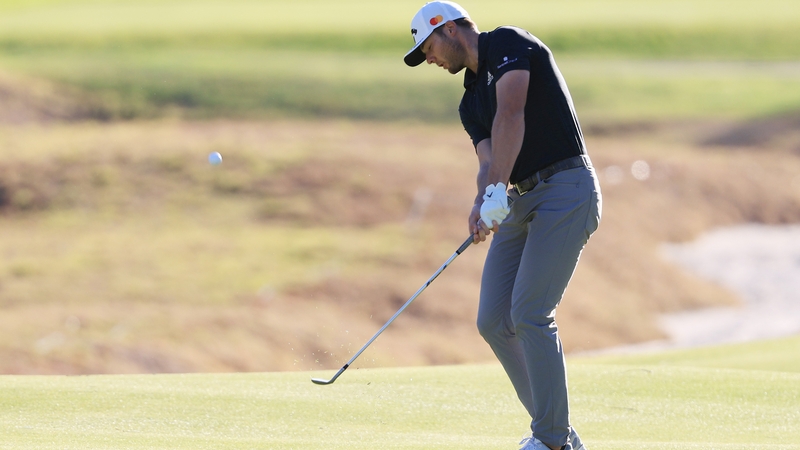 Sam Burns plays a shot from the fairway on the eighth hole at Pacific Palisades