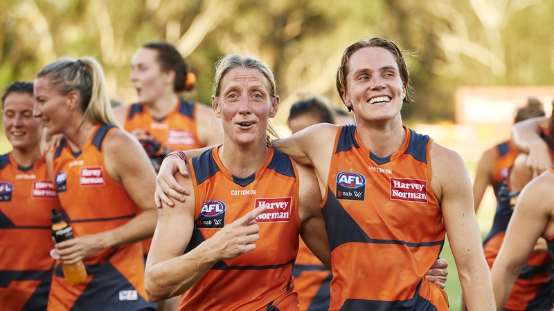 Cora Staunton celebrates victory with team-mate Pepa Randall