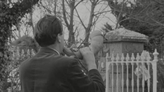 Man blowing ceremonial horn, Ballingrane, Co. Limerick (1966)