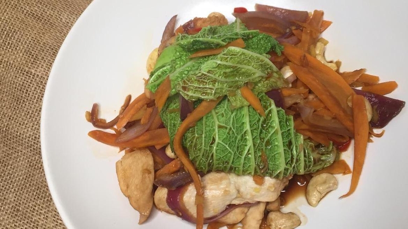 Chicken stir fry with pak choi, sweet potato, ginger and cashew nuts.