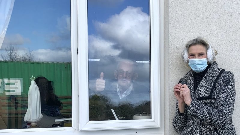 Irene Winters has regular window visits with her father at his nursing home