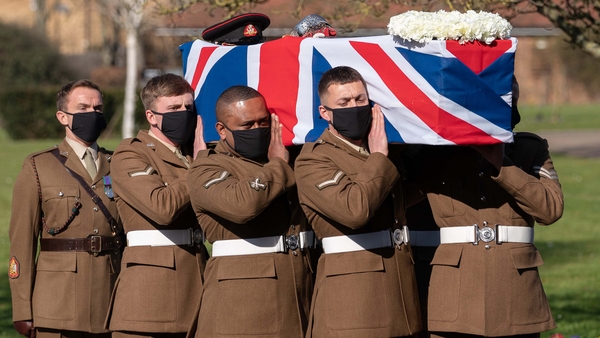 Soldiers from the Yorkshire Regiment carry the coffin into Bedford Crematorium