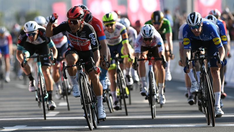 Caleb Ewan celebrates edging out Sam Bennett on the sprint to the line in Abu Dhabi