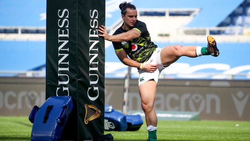 James Lowe warming up ahead of the game