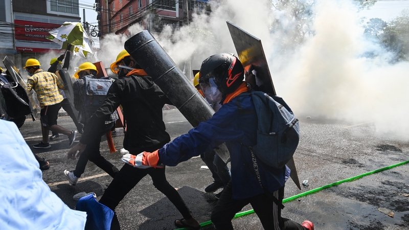 Police with water cannon and military vehicles were mobilised at protest hotspots in Yangon as crowds gathered to chant slogans