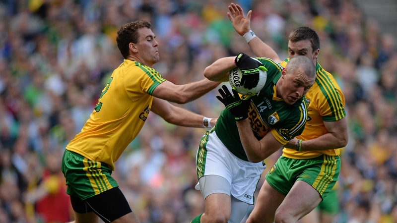 Éamonn McGee, left, and Leo McLoone tackle Kieran Donaghy during the 2014 All-Ireland final