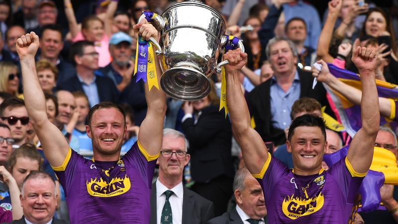 Joint Wexford captains Matthew O'Hanlon (L) and Lee Chin lift the Bob O'Keefe Cup two years ago