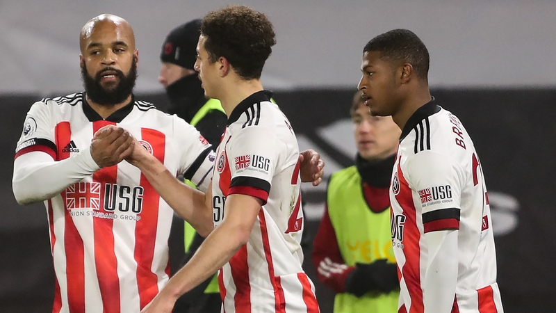 David McGoldrick (L) celebrates his goal
