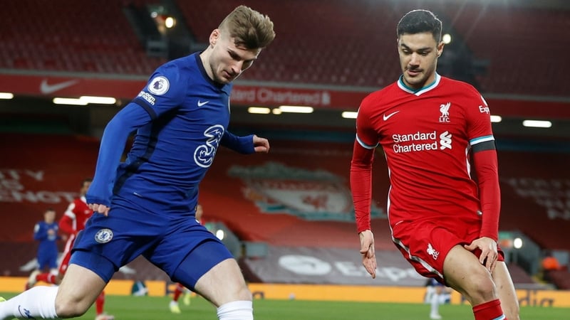Ozan Kabak (R) in action for Liverpool last season