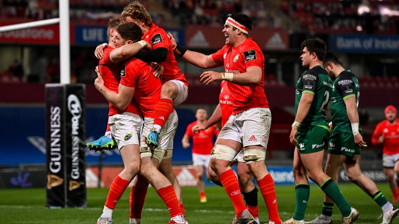 Mike Haley celebrates with Munster team-mates after his individual try against Connacht