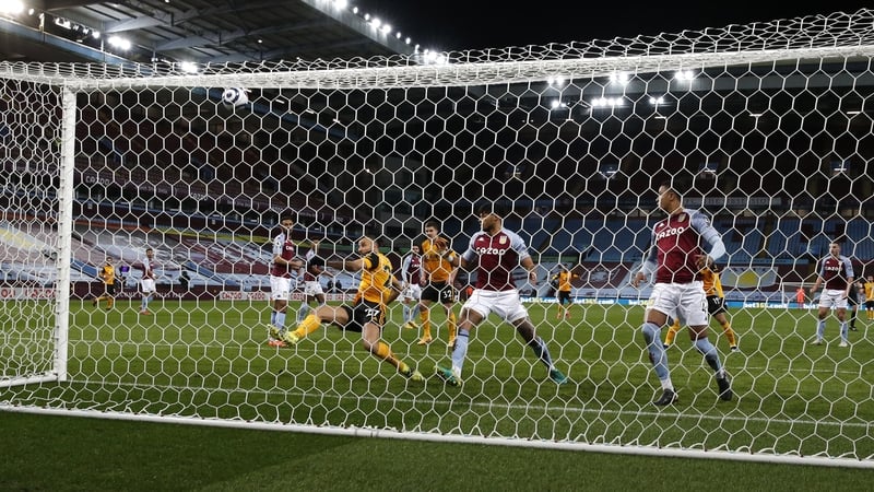 Romain Saiss misses from point-blank range