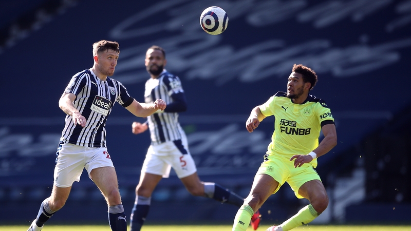West Brom's Dara O'Shea and Joelinton have eyes on the ball