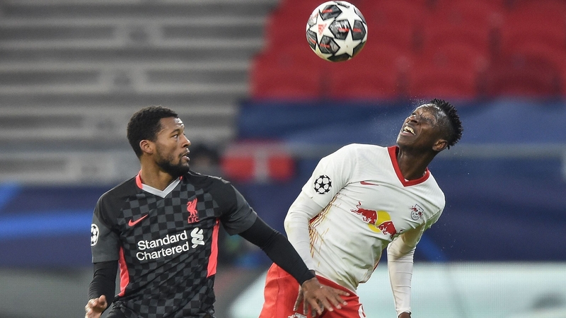 Wijnaldum in action against Leipzig's Amadou Haidara (R)