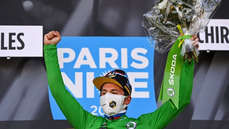 Primoz Roglic celebrates in his green jersey