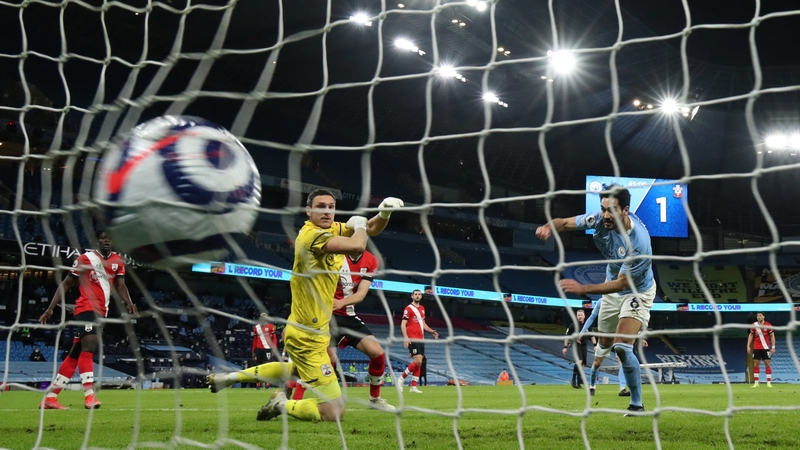 Ilkay Gundogan scores City's third goal on the stroke of half-time