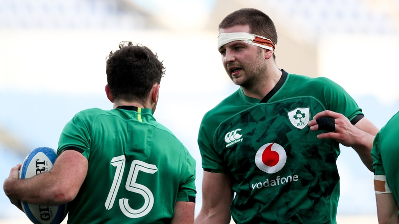 Iain Henderson (R) and Hugo Keenan in action against Italy