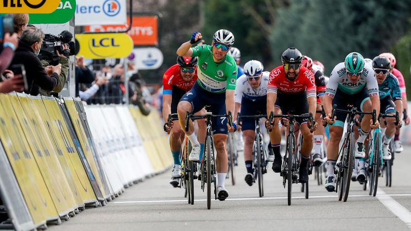 Sam Bennett celebrates crossing the finish line first