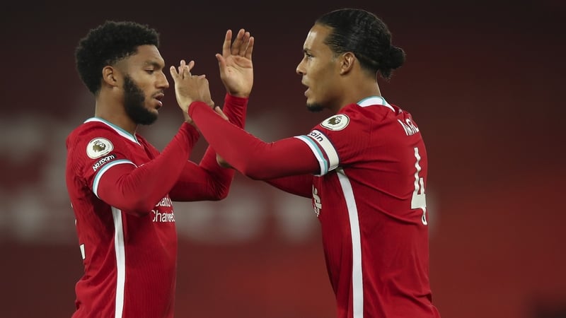 Joe Gomez (L) and Virgil van Dijk