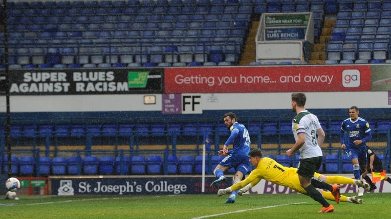 Troy Parrott sliding home his goal