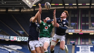 Keith Earls of Ireland competes for the ball with (L - R) Chris Harris and Stuart Hogg of Scotland