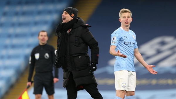 Pep Guardiola and Oleksandr Zinchenko