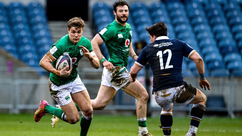Garry Ringrose in action against Sam Johnson of Scotland