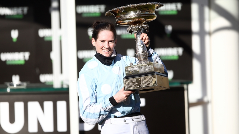Rachael Blackmore holds the Champion Hurdle trophy aloft