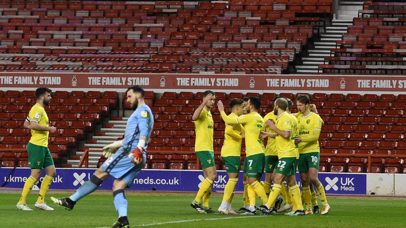 Kieran Dowell is mobbed after his goal for Norwich