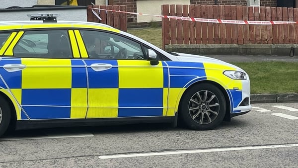 The three bodies were found at separate properties in Newtownabbey