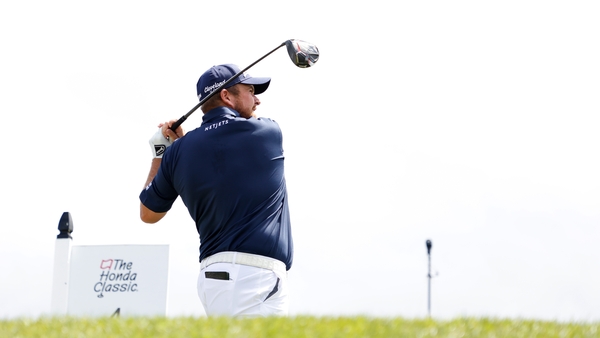 Shane Lowry plays his tee shot from the fourth on his third round at the Honda Classic