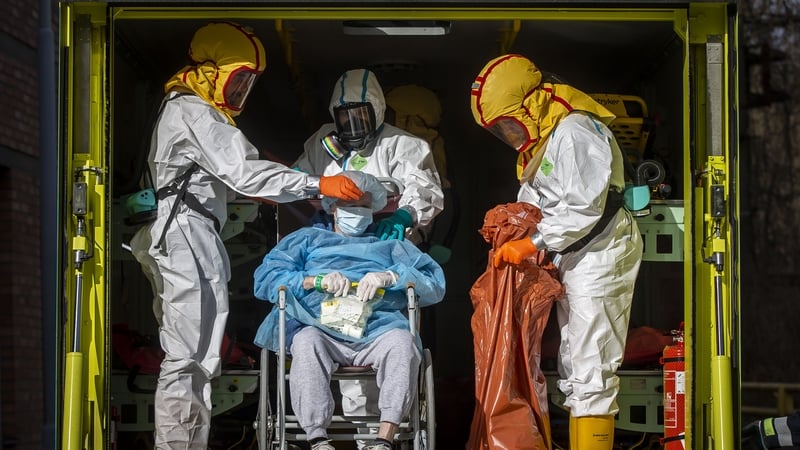 Czech medical staff transfer a patient from an overwhelmed hospital in Ceska Lipa to the hospital in Semily