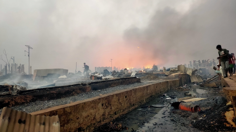 Thousands of shanties were destroyed as people scrambled to save their meagre possessions