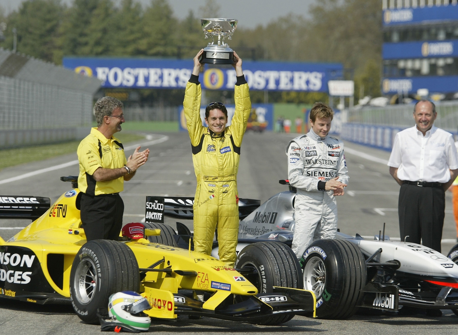 Fisichella and Eddie Jordan at the handover ceremony in Imola two weeks later