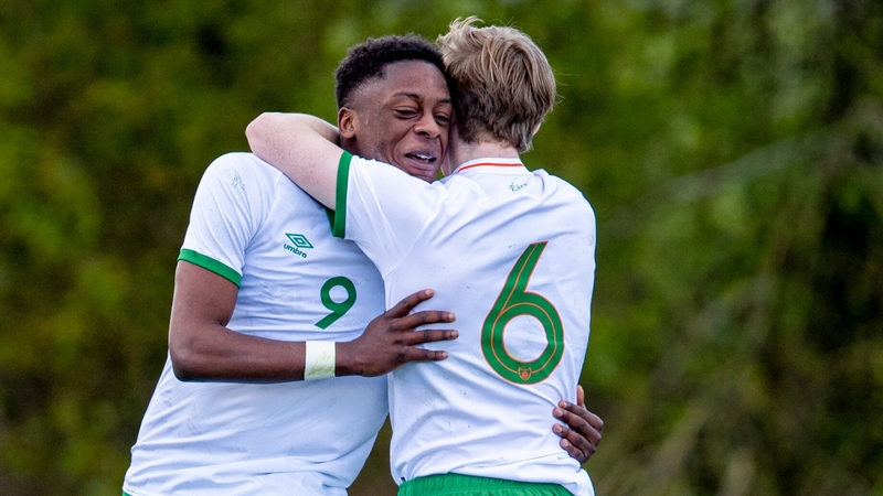 Jonathan Afolabi (L) celebrates his goal with Luca Connell