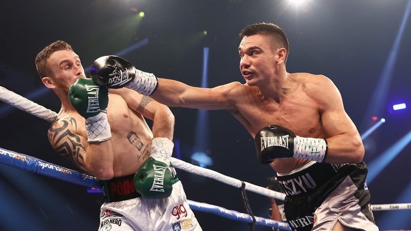 Dennis Hogan tries to evade the impressive Tim Tszyu