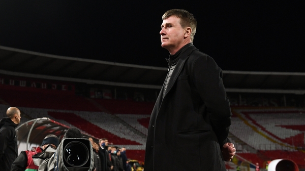 Stephen Kenny stands for the national anthems before the clash against Serbia