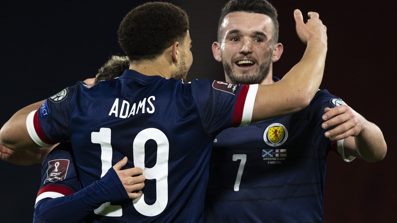 Che Adams celebrates with John McGinn