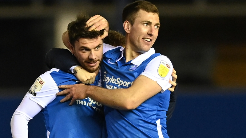 Scott Hogan is congratulated by team-mate Chris Gardner after his spot kick.