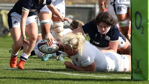 Bryony Cleall of England scores their team's fourth try