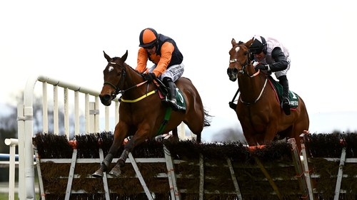 Jeff Kidder (l) just clears the last in front