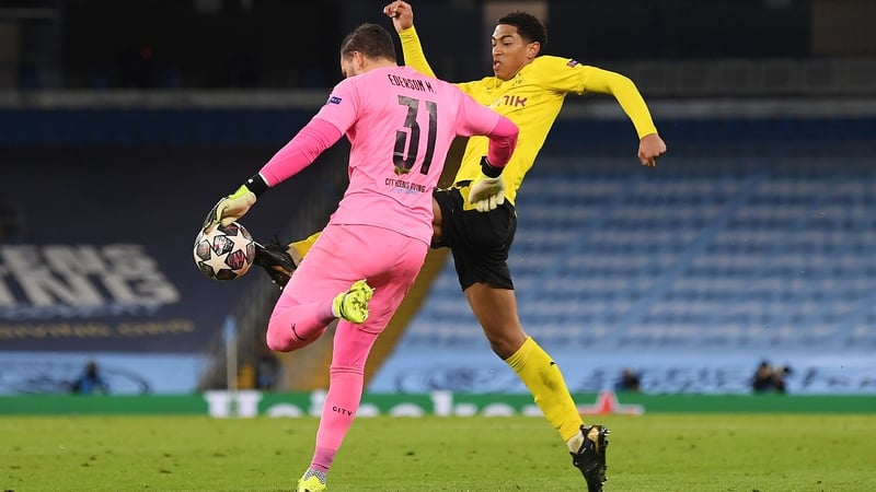 Jude Bellingham (R) nicked the ball away from Ederson but the whistle blew before he could tap into the empty net