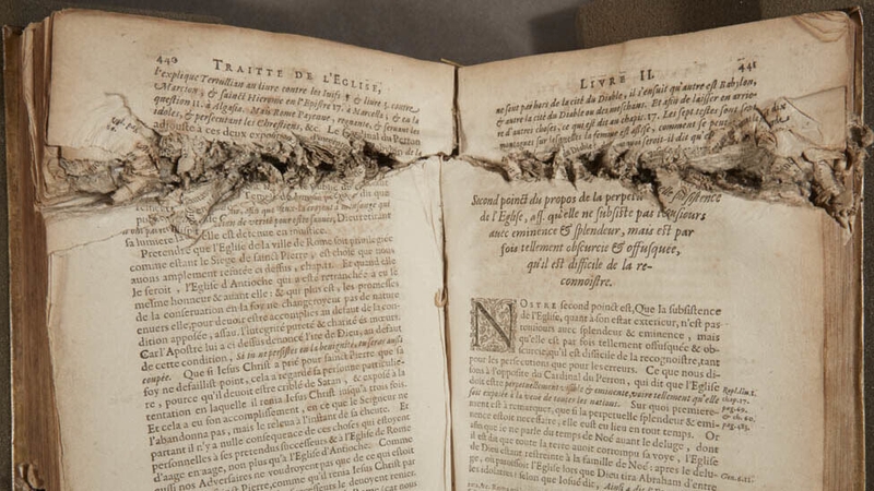 A British machine gun located in the Iveagh Buildings on Bull Alley sprayed the building with bullets, shattering windows and damaging books.