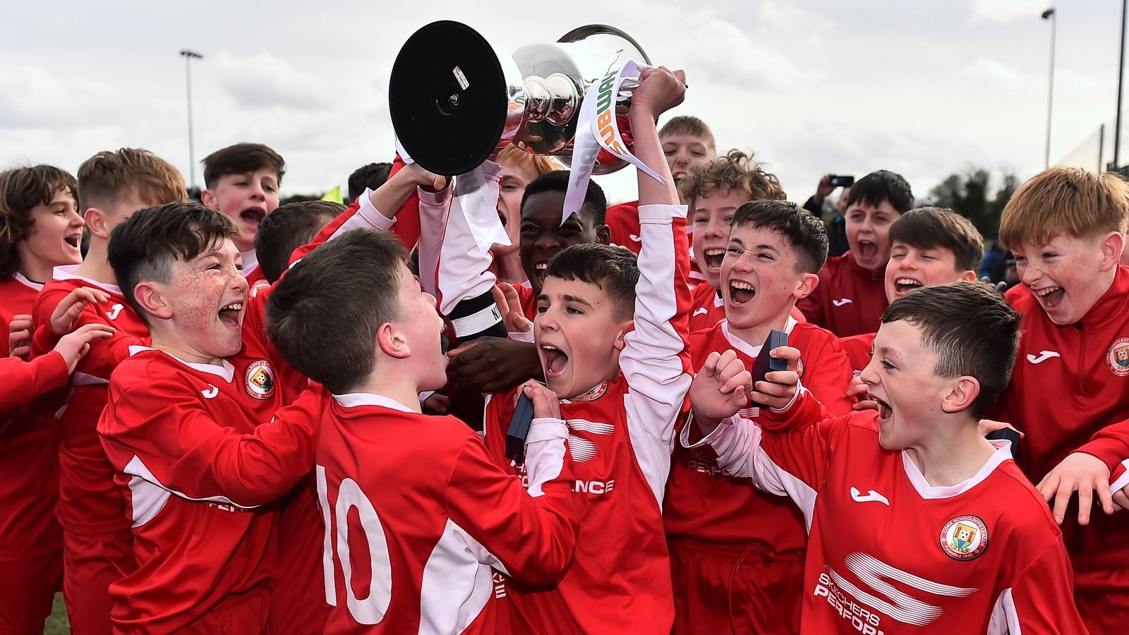 Cork Schoolboy League captain Matthew Moore lifts the U13 Liam Miller Cup last year