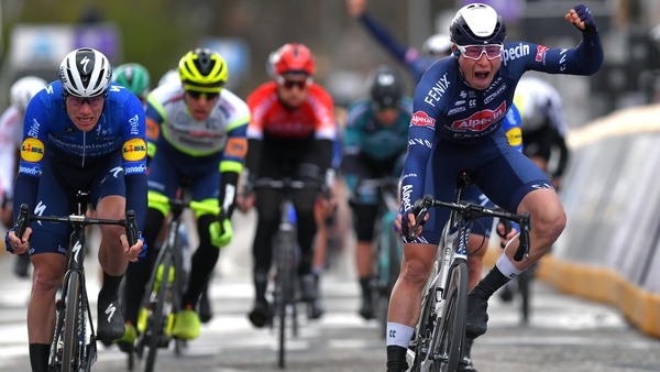 Jasper Philipsen, right, edges out Sam Bennett in the sprint finish
