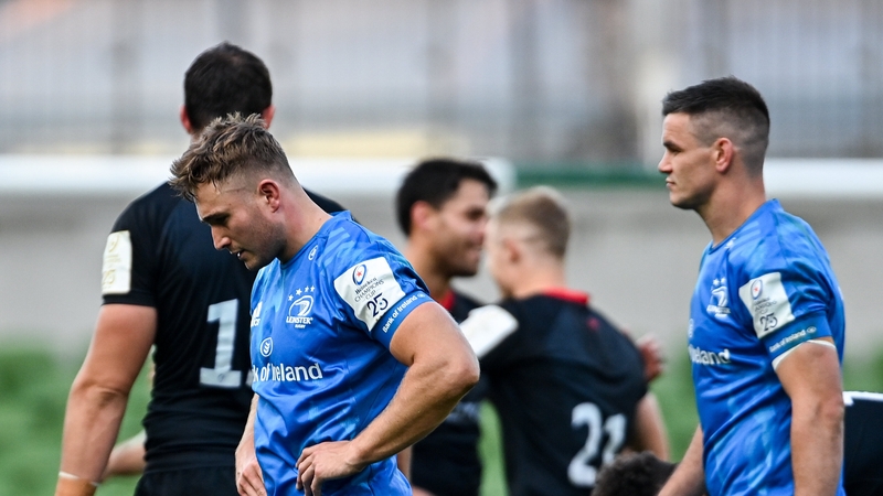 Jordan Larmour, left, and Jonathan Sexton after September's loss to Saracens