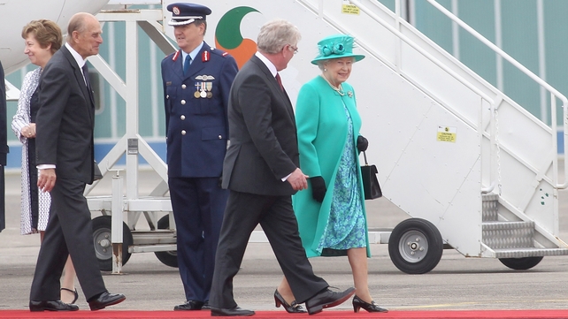 Prince Philip, Queen Elizabeth and Tánaiste Eamon Gilmore at Baldonnel Airport on 17 May 2011 in Dublin