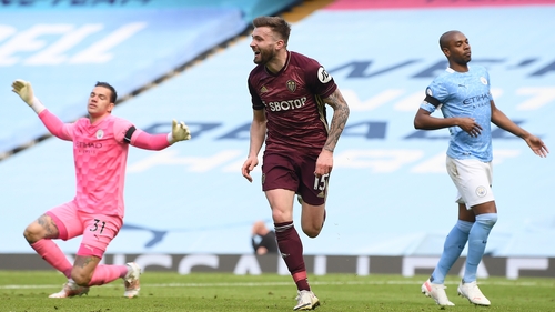 Stuart Dallas celebrates after scoring the injury-time winner for Leeds United