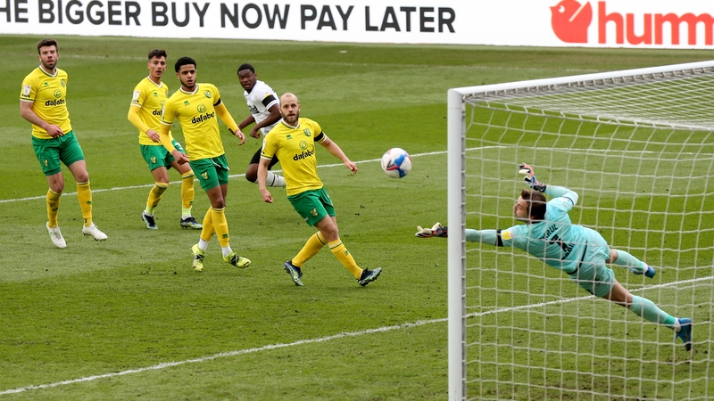 Omobamidele (centre) watches as Norwich keeper Tim Krul makes a late save against Derby