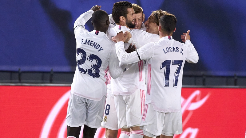 Toni Kroos is mobbed by his Real Madrid team-mates after scoring their second goal of the night